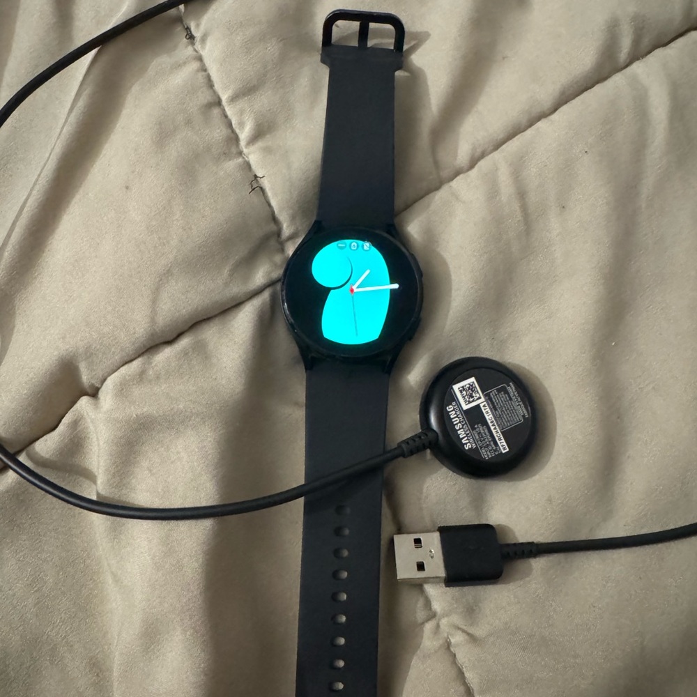 Samsung Black Smartwatch with Silicone Band with charger